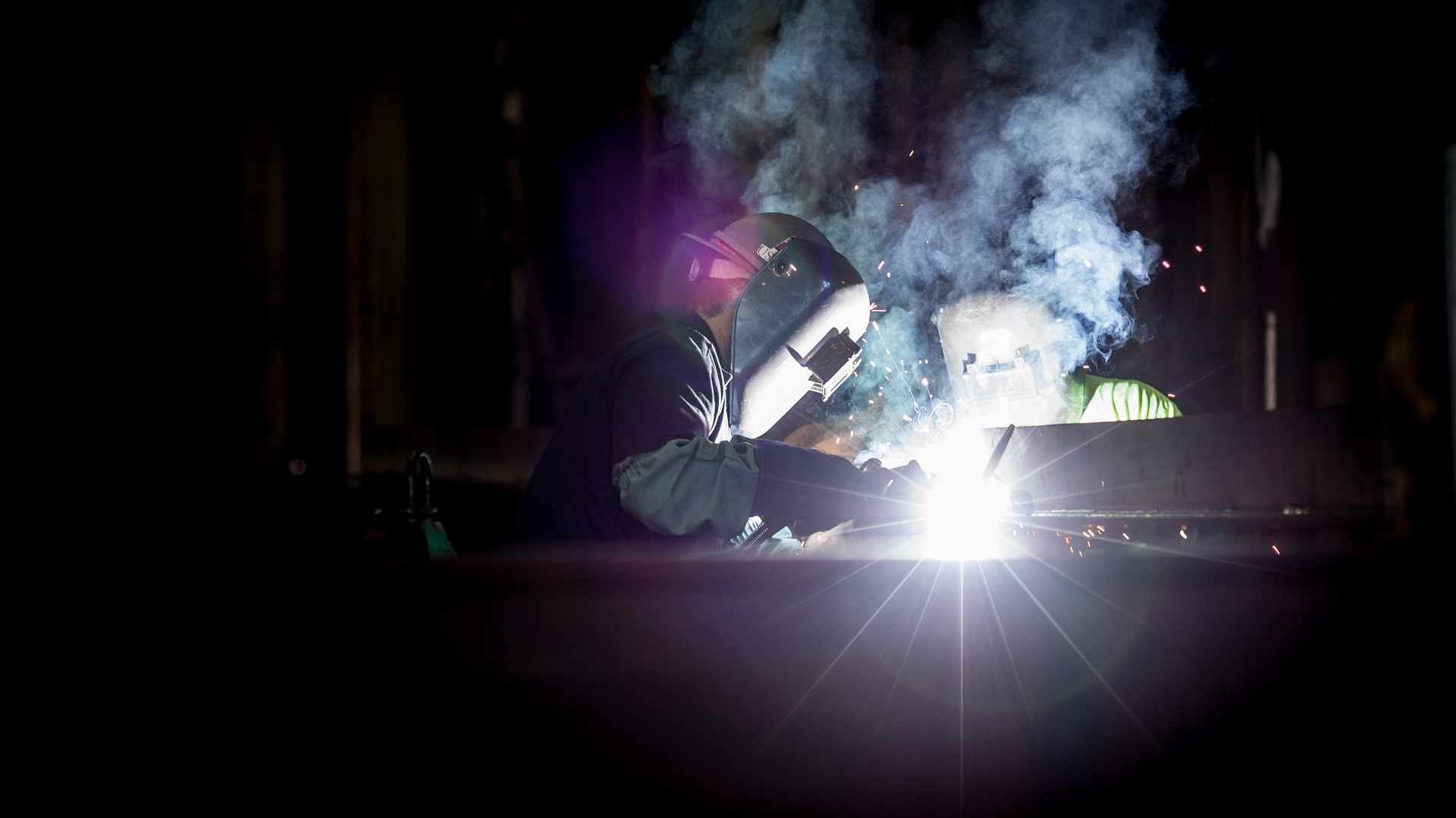 Man welding in a workshop